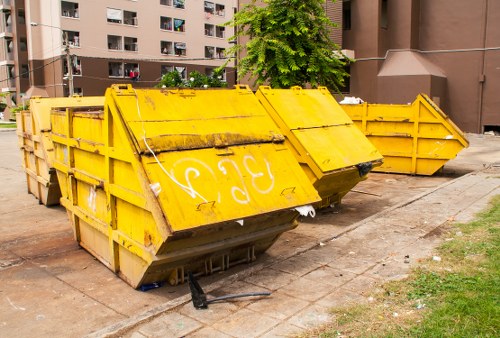 Waste removal service vehicle operating in East London