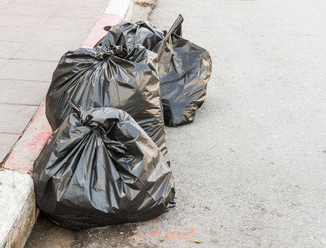 Recycling bins organized for different materials in East London